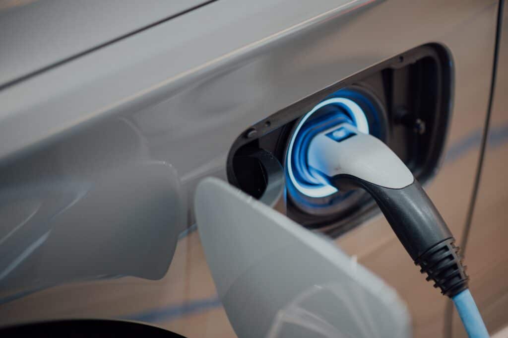a close up of a plugged into a car
